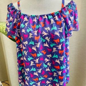 Contemporary blouse. Off the shoulder. Cold shoulder. Multi-colored.Crane print.